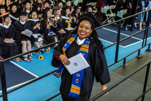 A 2019 graduate crosses the stage during Commencement